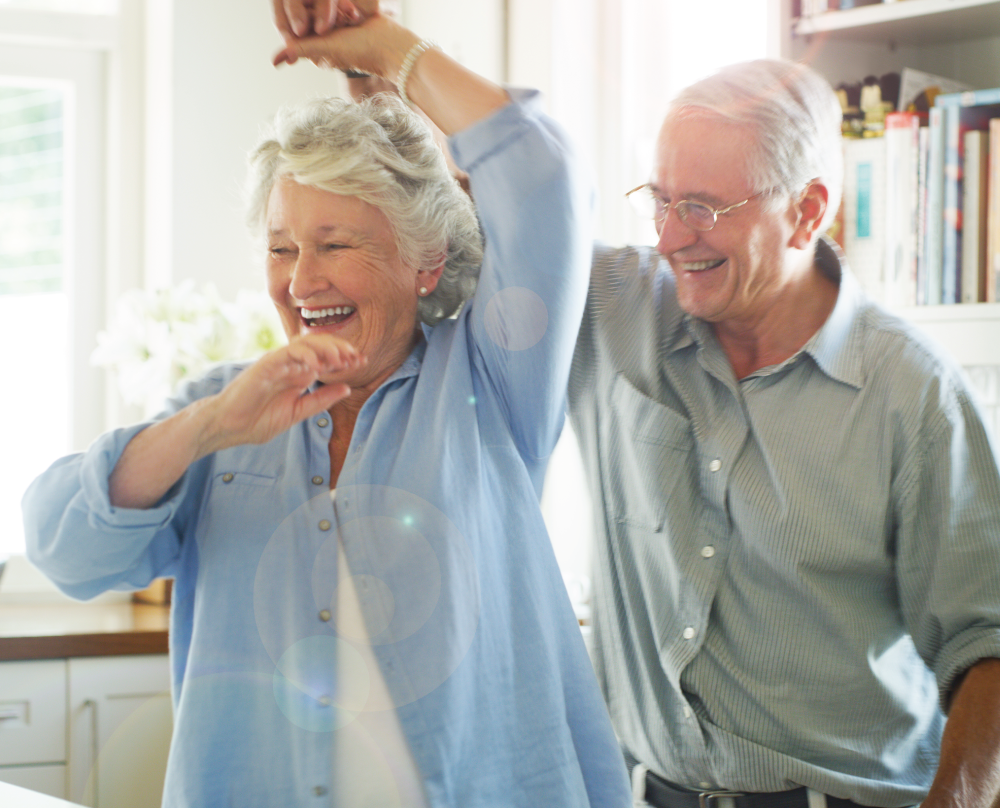 Senior Couple Dancing in their Kitchen