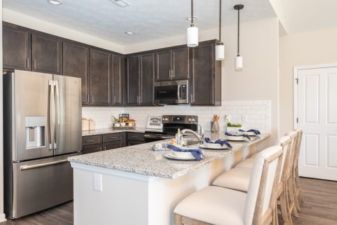 55+ Active Adult Villa kitchen with stainless french door refridgerator