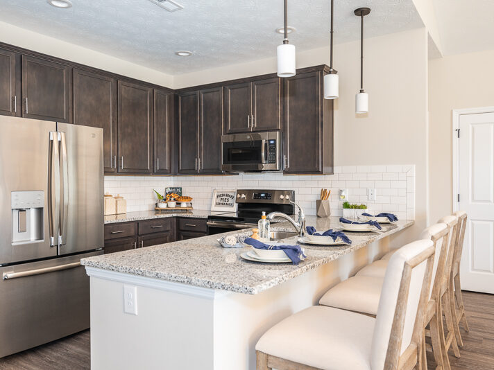 55+ Active Adult Villa kitchen with stainless french door refridgerator