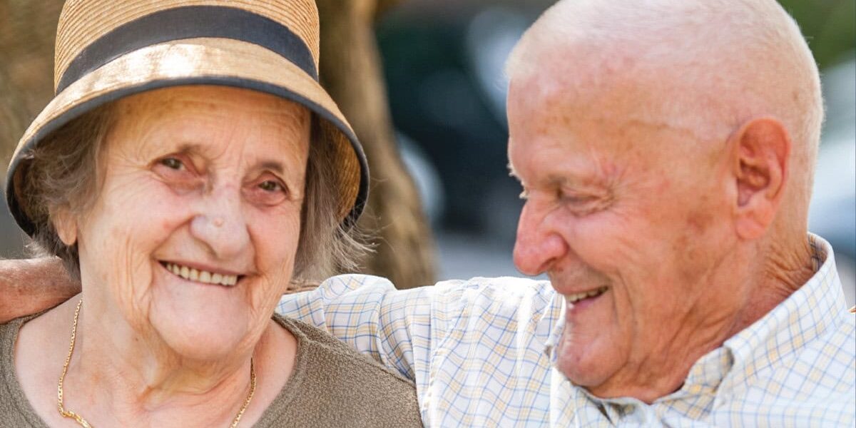 Senior woman with her spouse with dementia