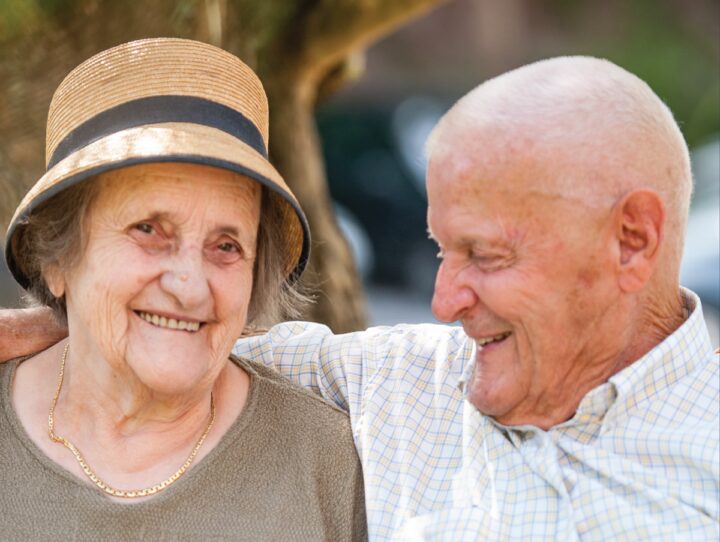 Senior woman with her spouse with dementia